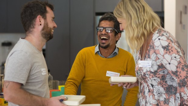 Lee Barlow, from England, Shanaka Fernando, from Sri Lanka, and host Cass Spong share a laugh at lunchtime.