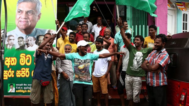 Supporters of UNP celebrate their party victory.