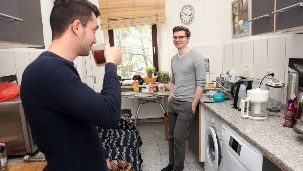 Impact Journalism Day: Syrian refugee Hamad and German medical student Constantin Thieme, in the unit they share in Berlin after Hamad and Thieme met using the service becoming known as "airbnb for refugees".