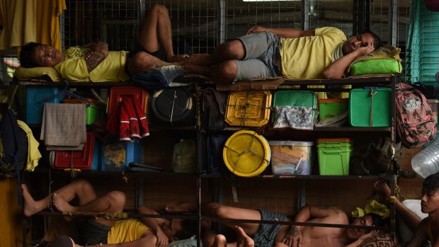 Prisoners sleep in a classroom in Quezon city jail.