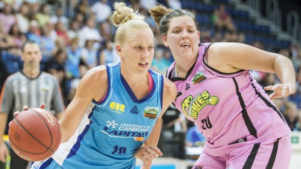 Sport.
January 9th 2015.

Round 12 of the Women's National Basketball League.  The Canberra Capitals v The West Coast Wave at the AIS Arena, Bruce.  Abby Bishop of the Canberra Capitals drives at the basket.

Canberra Times photo by Matt Bedford