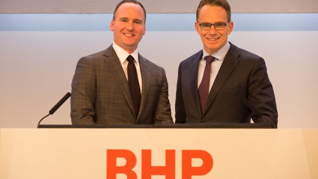 New broom, new logo: BHP chairman Ken MacKenzie pictured with chief executive Andrew Mackenzie.
