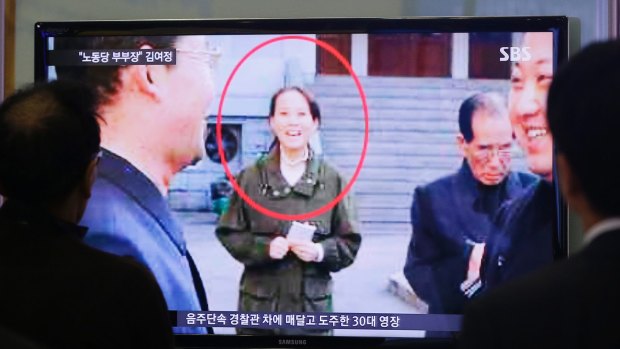 People watch a news program showing Kim Yo-jong at Seoul Railway Station in November.