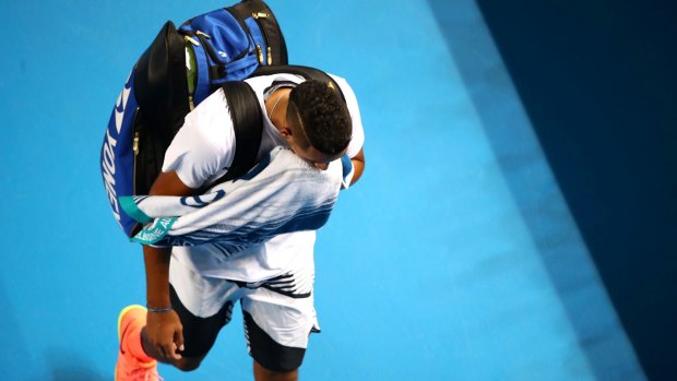 Nick Kyrgios leaves the court on Wednesday night.