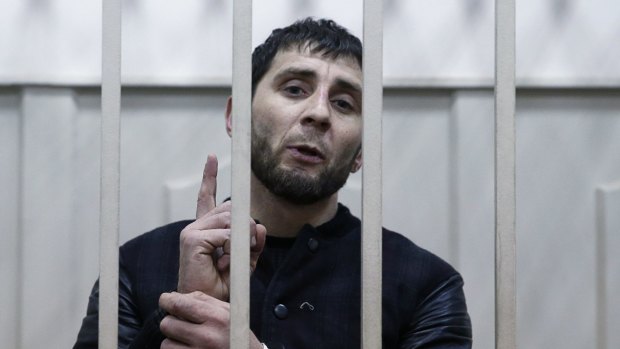 Zaur Dadayev, charged with the murder of Boris Nemtsov, inside a defendants' cage in Moscow.