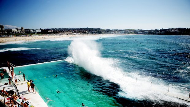 A wave swamps the pool at Bondi Icebergs.
