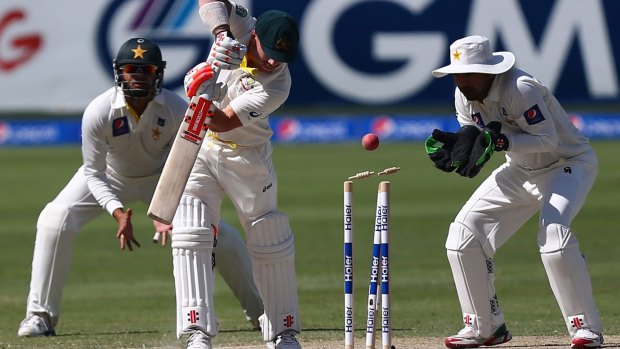 Gone: Warner is bowled by Yasir Shah for 133, the opener's third consecutive Test century.