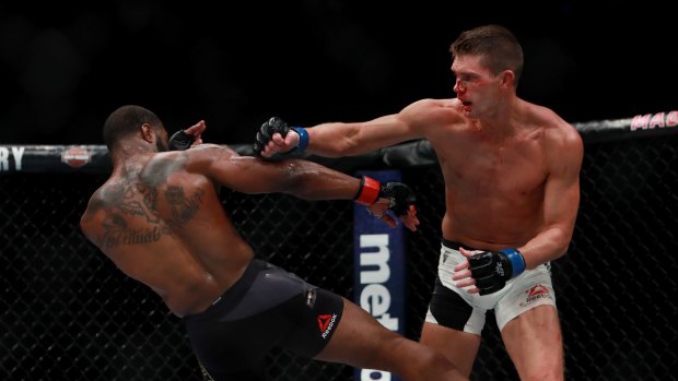 Tyron Woodley (left) in action against Stephen Thompson in their welterweight championship bout.