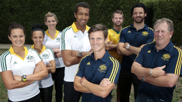 Canberra players front, Paul MacKinnon, rear from left, Shelley Watson, Kizziah Plumb, Peta Sutherland, Seyi Onitiri, Gary Backhus, Matthew Hotchkis with team manager Brent Deans have been selected to represent Australia at the FIH Indoor Hockey World Cup Germany.