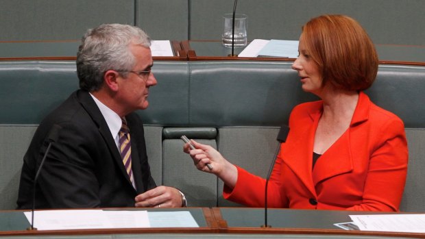 Tasmanian independent Andrew Wilkie and former Labor PM Julia Gillard fell out over an abandoned pokies deal.