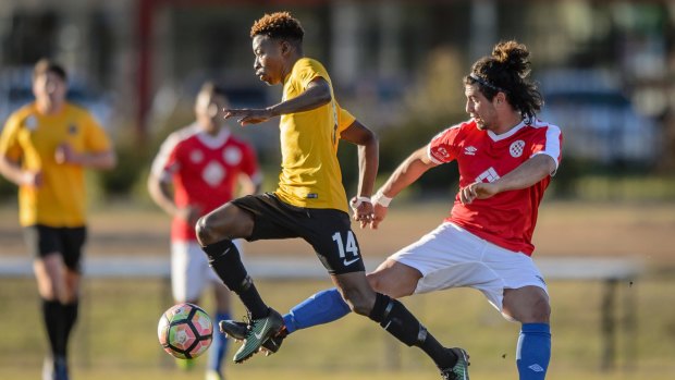 Gungahlin United's Augustine Bangura and FC's Juliano Borgna.