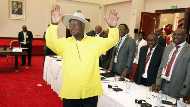Ugandan President Yoweri Museveni, in yellow shirt, makes his presence felt at the peace talks this week. Burundian President Pierre Nkurunziza, now in his third term in office, did not attend the talks.
