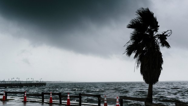 Waves crash against a seawall before Hurricane Irma arrives in Jensen Beach, Florida.