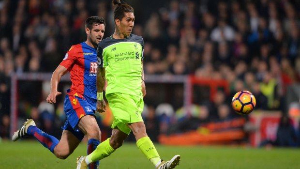 Tight at the top: Roberto Firmino scored for Liverpool in their 4-2 win at Crystal Palace.