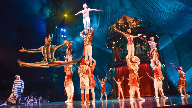 The Innocent (far left) and the Trickster, doing splits in the air, take Cirque du Soleil back to where it all began.
