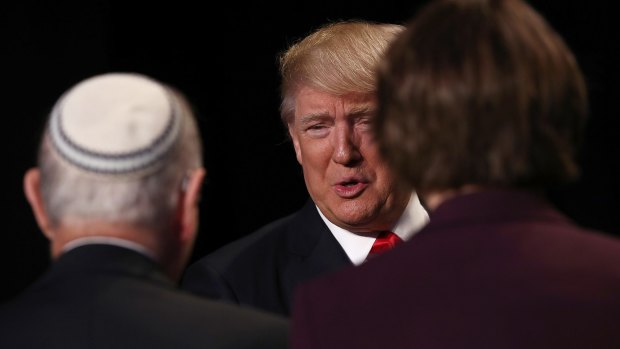 Donald Trump greets attendees during the National Prayer Breakfast in Washington on Thursday.