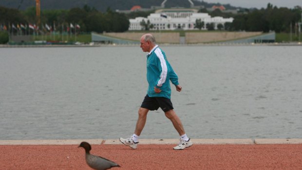 Former prime minister John Howard on one of his legendary morning walks.