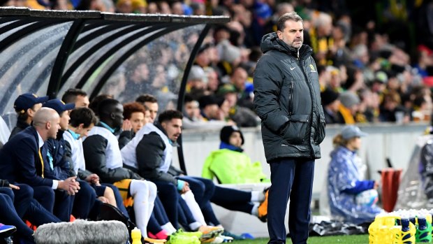 Rough night: Ange Postecoglou could only watch on as his side scraped through against Thailand.