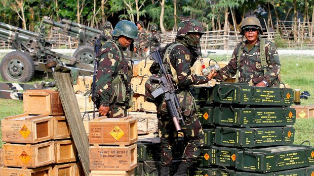 Philippine soldiers check ammunition in Maguindanao.