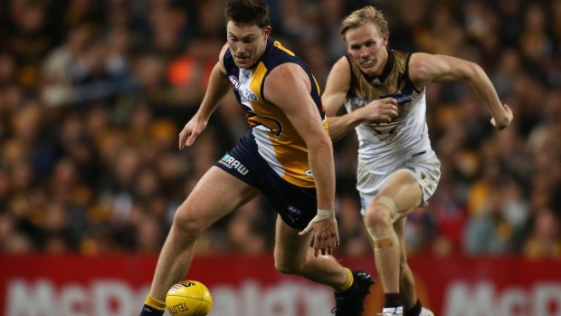 Traditional footballer: Jeremy McGovern only has eyes for the ball in the qualifying final against Hawthorn