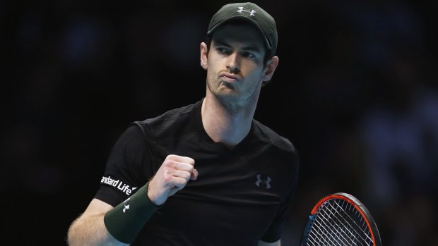 Andy Murray celebrates winning the first set against Stan Wawrinka.