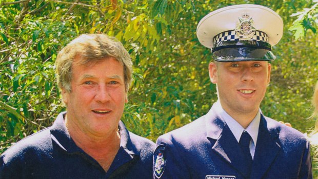 Michael Maynes and his father Robert on his graduation day. 