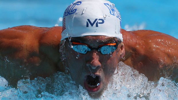 Another win: American swimming superstar Michael Phelps won the 200m butterfly against huge gusts of wind in Arizona.