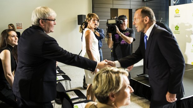 Here to help: Kevin Rudd greets Tony Abbott at the opening of the Chris O'Brien Lifehouse Hospital in Camperdown. 