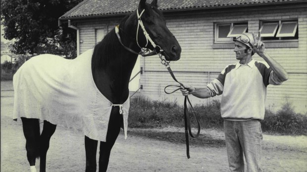 T.J. Smith's stable foreman Tom Barker with champion galloper Kingston Town.