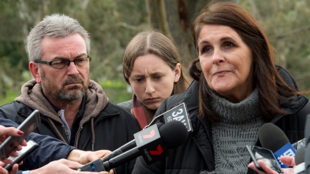 Karen's husband, Borce, their daughter, Sarah, and Karen's aunt Patricia Gray, speak to the media last year.