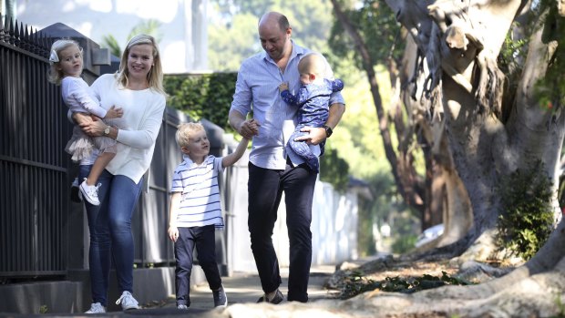 Grace and Alexander Atkinson in Woollahra with their children Jack, 4, Alice, 3, and baby Hugo. 