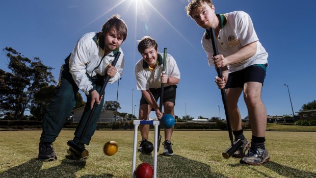 No money in it: Elite croquet players (left to right) Robert, Greg and Mal Fletcher of Dundonnell, practise at Lismore Croquet club in western Victoria.  