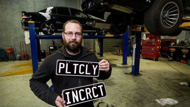 Ricky Muir with his Holden Calais 'PLTCLY INCRCT' at a workshop in Sale, Victoria. He built the vehicle for burnouts, and is participating in the Bairnsdale Burnout Competition.