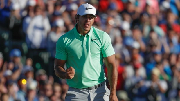 Open the account: Tournament champion Brooks Koepka celebrates after the fourth round of the US Open in what is his first major tournament win.