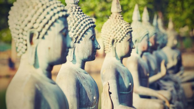 Statues of Buddha in The Seema Malaka Temple, Gangaramaya in Colombo.