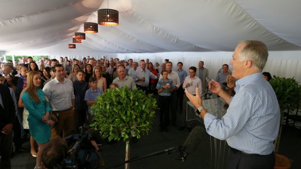 Prime Minister Malcolm Turnbull addresses politicians and their families during a family day at The Lodge in February. 