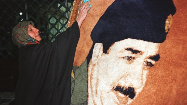 Larger-than-life posters of Saddam Hussein were everywhere.