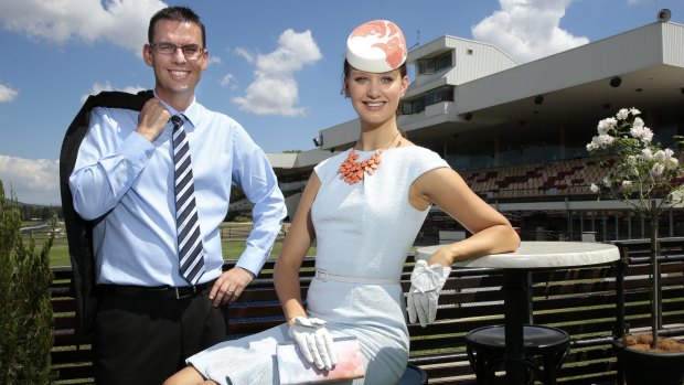 Face of Canberra Racing Emily Dibden with Canberra Racing Club chief financial officer Andrew Clark in the Seppelt marquee at Thoroughbred Park ahead of the 2015 Black Opal Stakes Day. 