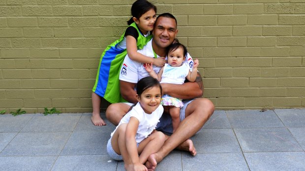 Canberra Raiders player Jeff Lima with his three daughters, from left, Giaan, 5, Mataua, 4, and Bobbie, seven months, at their family home in Garran. 