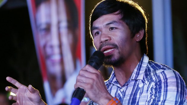 Boxing star Manny Pacquiao on the campaign trail earlier this year.