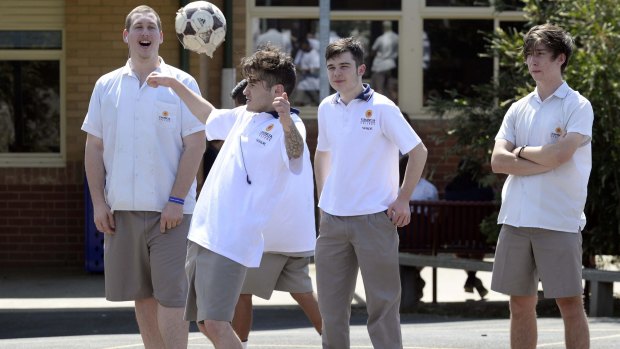 Kambrya College students practise their soccer skills.