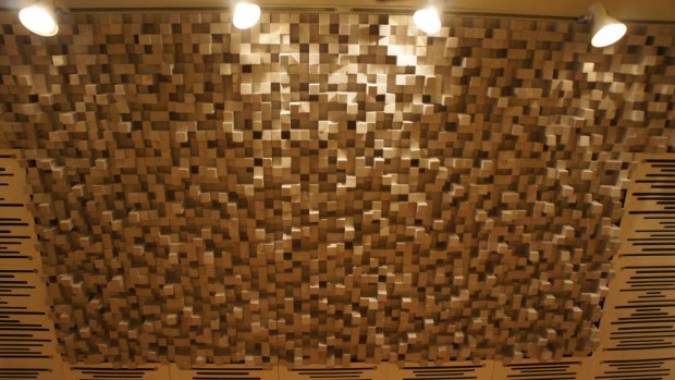 Acoustic panels can range from plain to decorative.