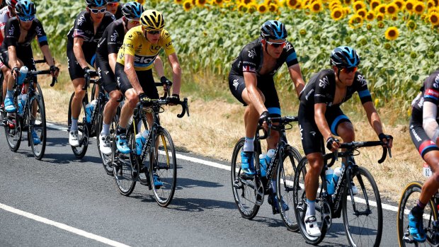 Warm favourite: The Sky boys and I look after Chris Froome on stage 13.