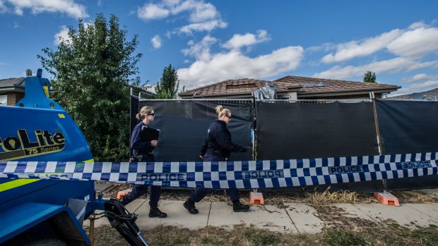 ACT policing, AFP and forensic officers at the scene of the house fire and triple death in Peter Coppin street, Bonner- day two. 