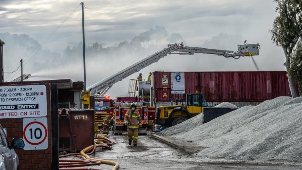Firefighters at the recycling plant in Coolaroo.