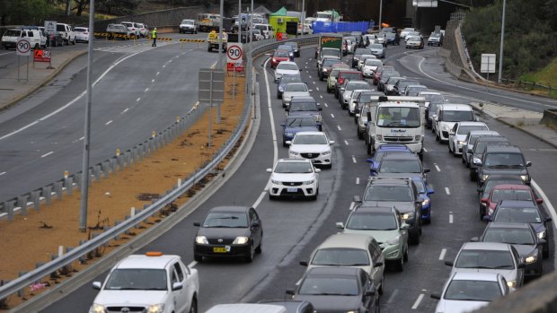 Heavy traffic on Parkes Way after the Acton tunnel crash in 2015: Infrastructure Australia says the ACT needs to build public transport capacity east to west. 