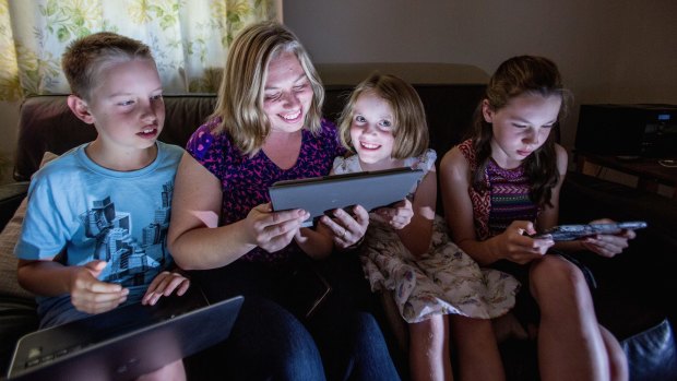 Recycling electronics: Larissa Shashkof, with children Harry, Elly and Lucy Boyd, has an e-waste box in their home. 