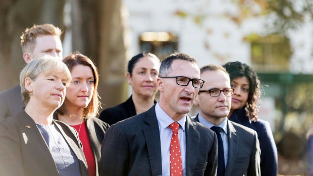 Greens leader Richard Di Natale (centre) with his inner-Melbourne candidates and local MP Adam Bandt.