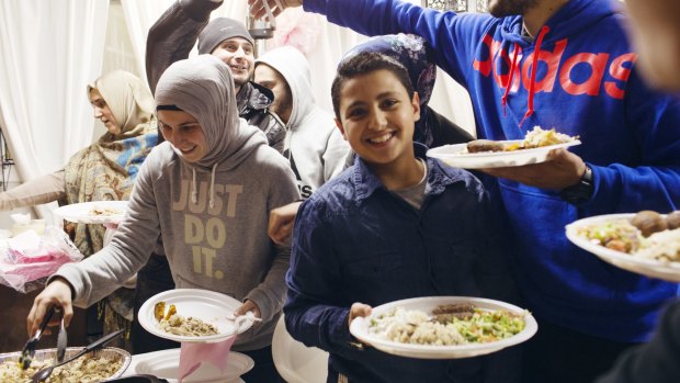 Celebrating: The Chafic family and their friends gather in Bankstown for the first feast of Ramadan.