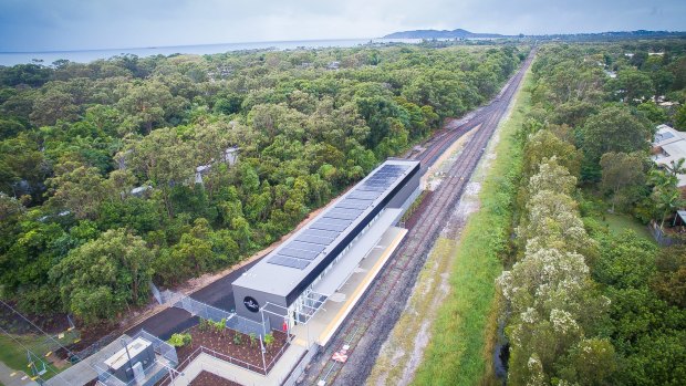 Byron's North Beach station with a view south to Byron Bay along the train line. Solar panels on the shed roof will power the world's first solar train.